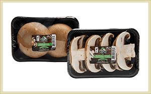 whole and sliced organic portabello mushrooms with Farmers' Fresh label